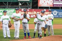 Zander Clark of West Fairlee, VT throws the first pitch before a Vermont Lake Monsters minor league baseball team's game at Centennial Field in Burlington, VT on Friday, Aug. 14, 2015. (Oliver Parini photograph).
