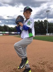 Zander Clark of West Fairlee, Vt., poses for his baseball card photo the Vermont Lake Monsters, minor league baseball team, on Friday, Aug. 14, 2015. (courtesy photograph)